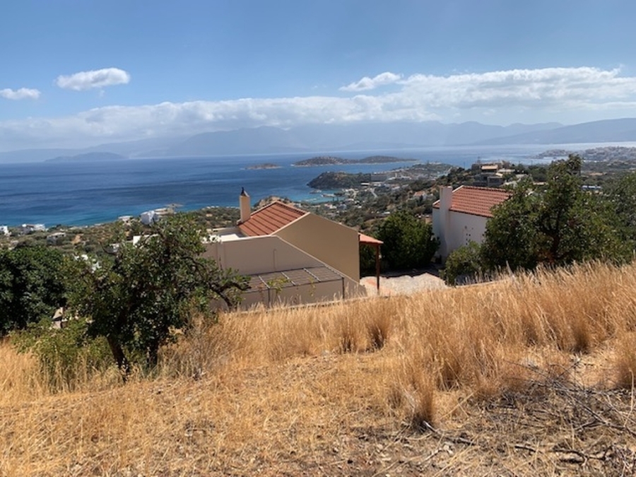 Land plot with  views to the sea and the town of Aghios Nikolaos 